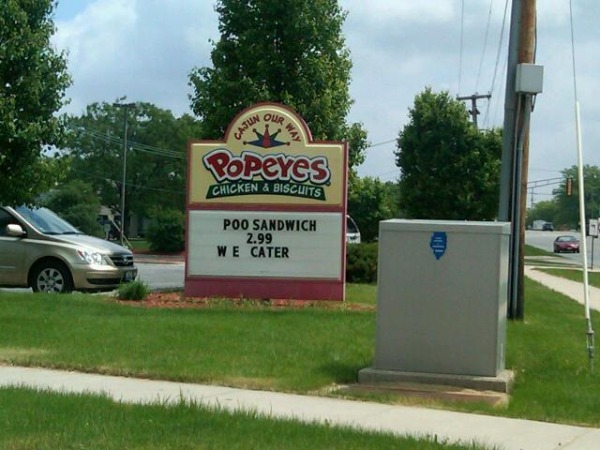 signage - Popeyes Poo Sandwich 2.99 We Cater