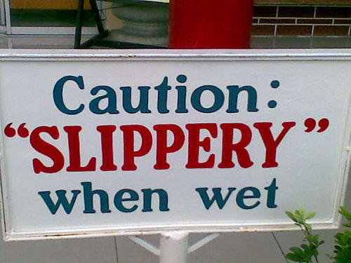 banner - Caution "Slippery when wet
