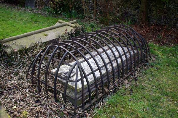A Victorian era cage built around a coffin, to void off the impending threat of vampire corpses.