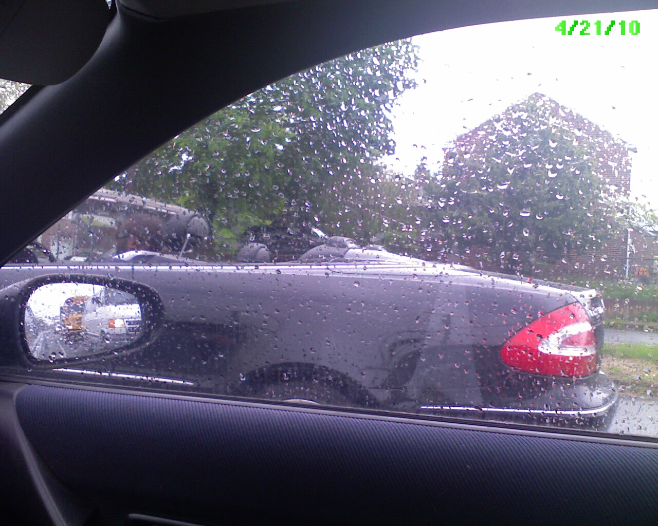 No one looks cool with the top down while its raining!!!