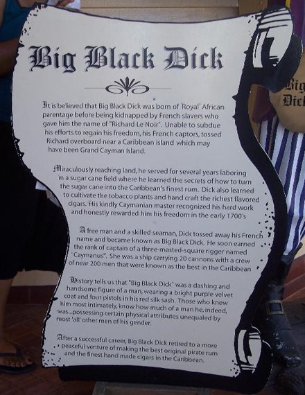Picture of a historical sign and description about a man given the name of Big Black Dick.
