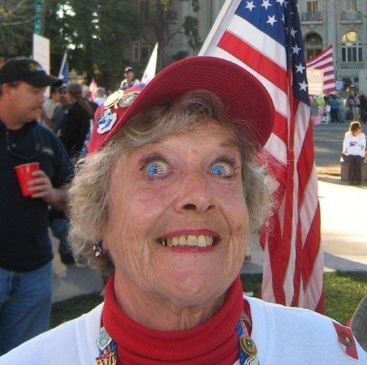 If you can stand to look deep into her eyes you will see that she loves her country. It looks kind of creepy though...