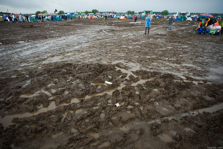 Concert Fans in the Rain and Mud