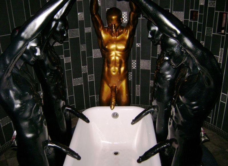 Did he really need four black and one gold?
Think he has a golden shower fetish?
How the fuck do you actually place an order for something like this?
Does Home Depot carry these or are they special order?
How rich do you need to be to buy five naked man statues pissing in your tub?