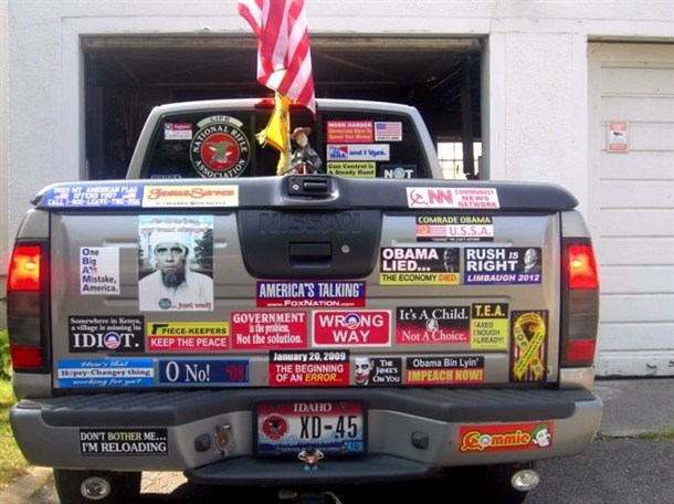 Irony is putting all these stickers and the flag on a Nissan.