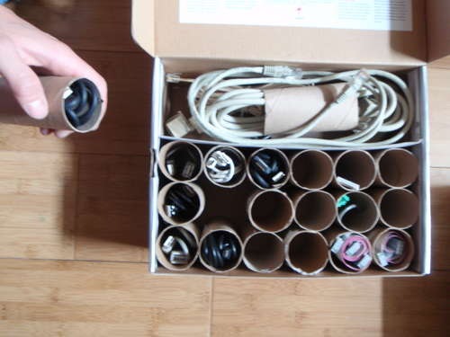 old cardboard toilet rolls are great for cord storage 