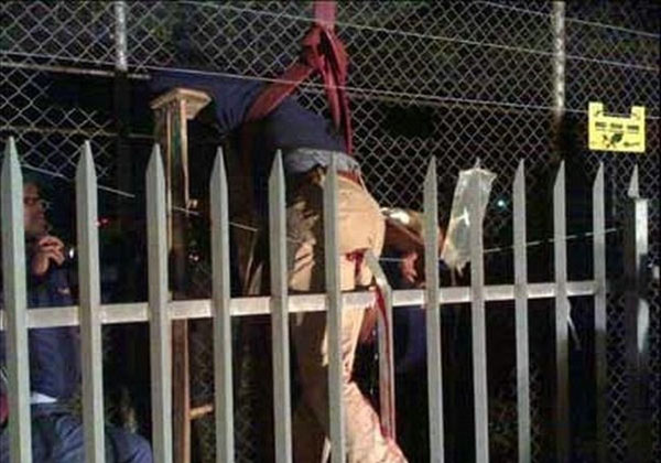 Thief Impaled by Fence... Graphic