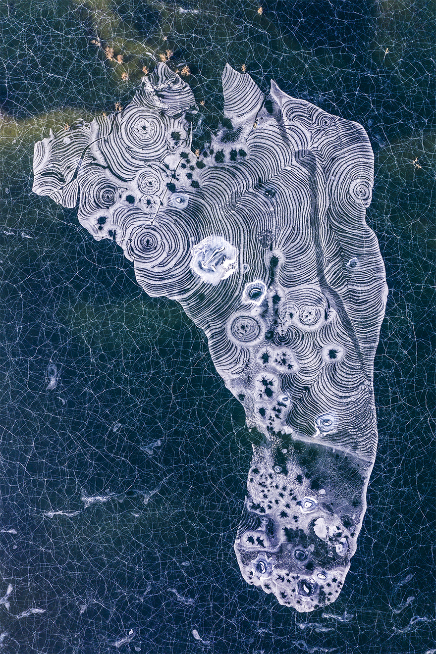 #22 Third Prize Winner In Nature Category - Huge footprint design created by ice in the Taklimakan Desert, China.