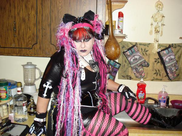 whacky goth girl in her kitchen