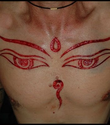 carving scarification tattoo