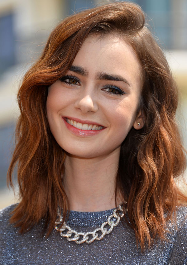 Lily Collins: Actress, daughter of Phil Collins.