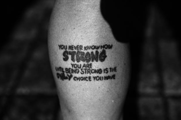 Steen has this tattoo on his left leg. It is a reminder to never give up. He has previously trained to enter two Ironman races only to have to give up due to injuries.