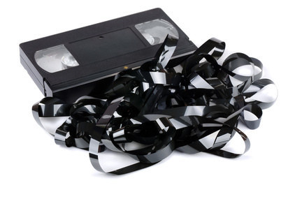 Rewinding or fixing a video tape.