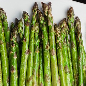 Consuming asparagus affects the smell of urine, but only 22% of the population have the gene to smell it.   <a href= "http://en.wikipedia.org/wiki/Asparagus#Urine" target="_blank">Source</a>.
