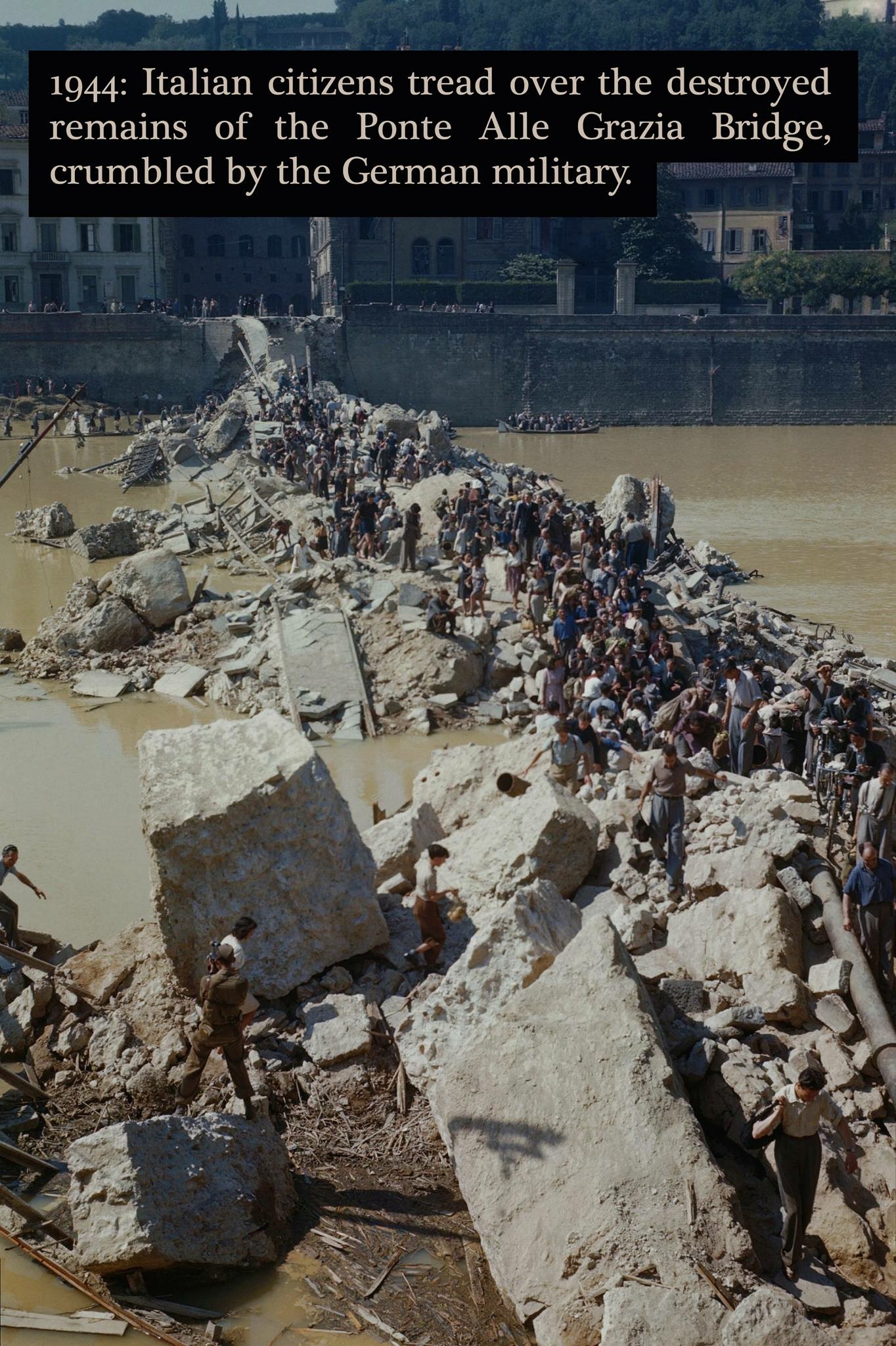 Ponte alle Grazie - 1944 Italian citizens tread over the destroyed remains of the Ponte Alle Grazia Bridge, crumbled by the German military.