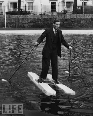 25 Sea-Shoes, 1962 Inventor M W Hulton demonstrates his sea-shoes and duckfoot propellers on the Grand Union Canal, England.