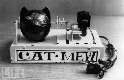 27 Cat-Mew Machine, 1963 This mechanical cat can meow ten times a minute and the eyes light up each time. The device for scaring rats and mice is from Japan and is powered by a two-watt motor.