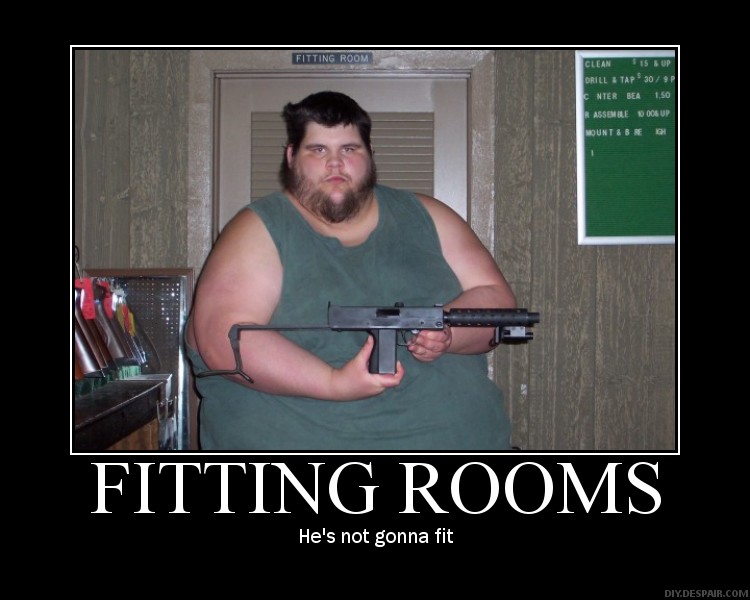 Fat guy in front of fitting room