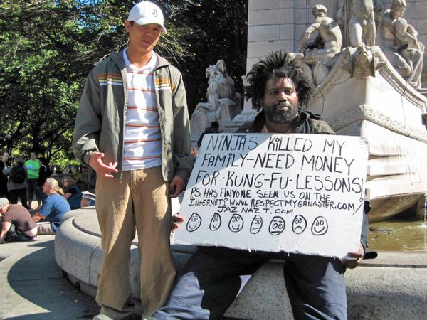 Homeless people with signs