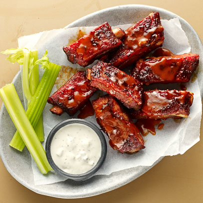 Buffalo'd Bones.  Slow-smoked center cut St. Louis-style spare ribs, fried, tossed in buffalo sauce and served with blue cheese dressing and celery