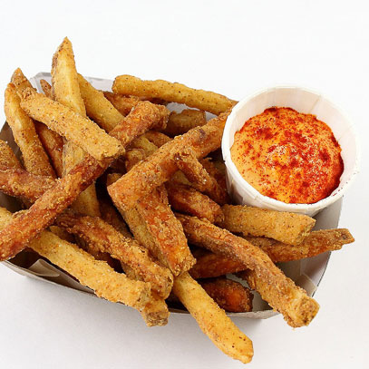 Indi Frites.  Indian-seasoned russet and sweet potato fries in a crispy batter