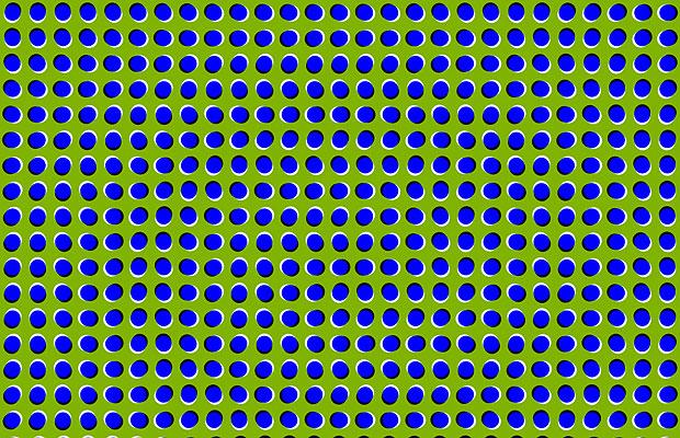 The brain's reaction to the colour contrasts and position of the shapes is such that this static image appears to be moving