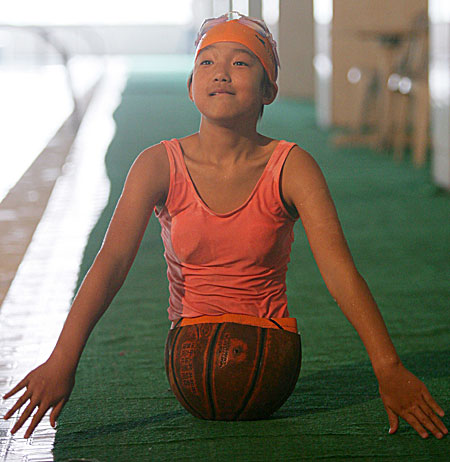 Girl Has Basketball for Legs
