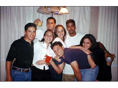 With her Father and friends, 2000.