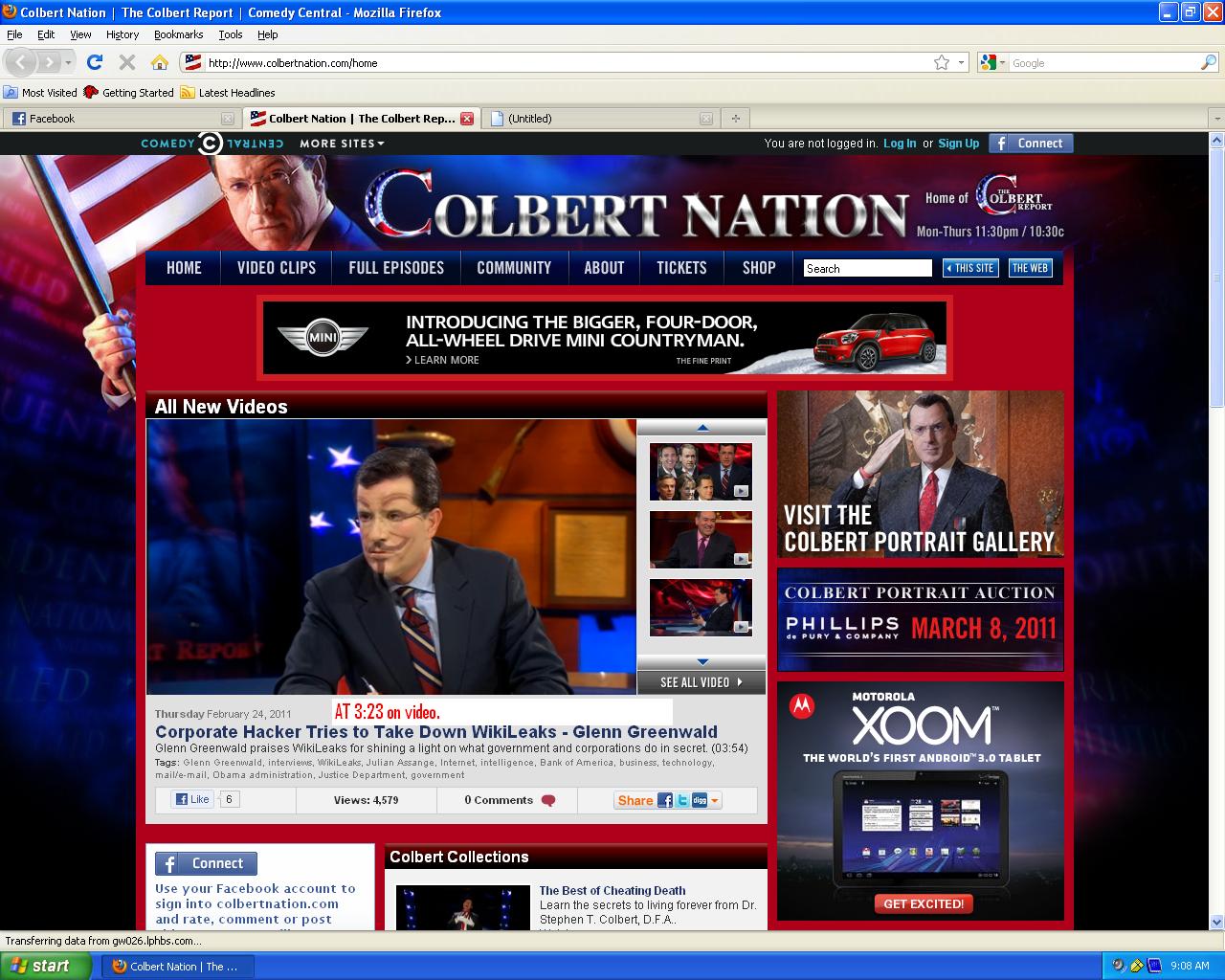 Okay, freaking out here a little. This was at 3:23 on the video talking about Cyber-Warfare with corporate interests.

http://www.colbertnation.com/the-colbert-report-videos/375429/february-24-2011/corporate-hacker-tries-to-take-down-wikileaks---glenn-greenwald

The image was superimposed over his face for a fraction of a second and looks... li