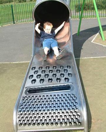 kid on slide