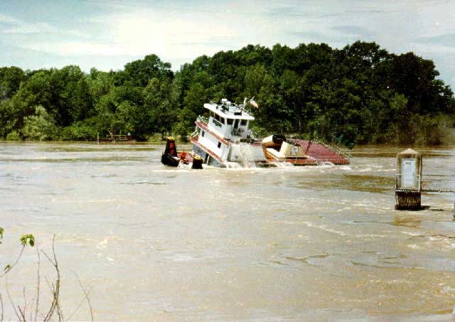 Tug boat hits bridge