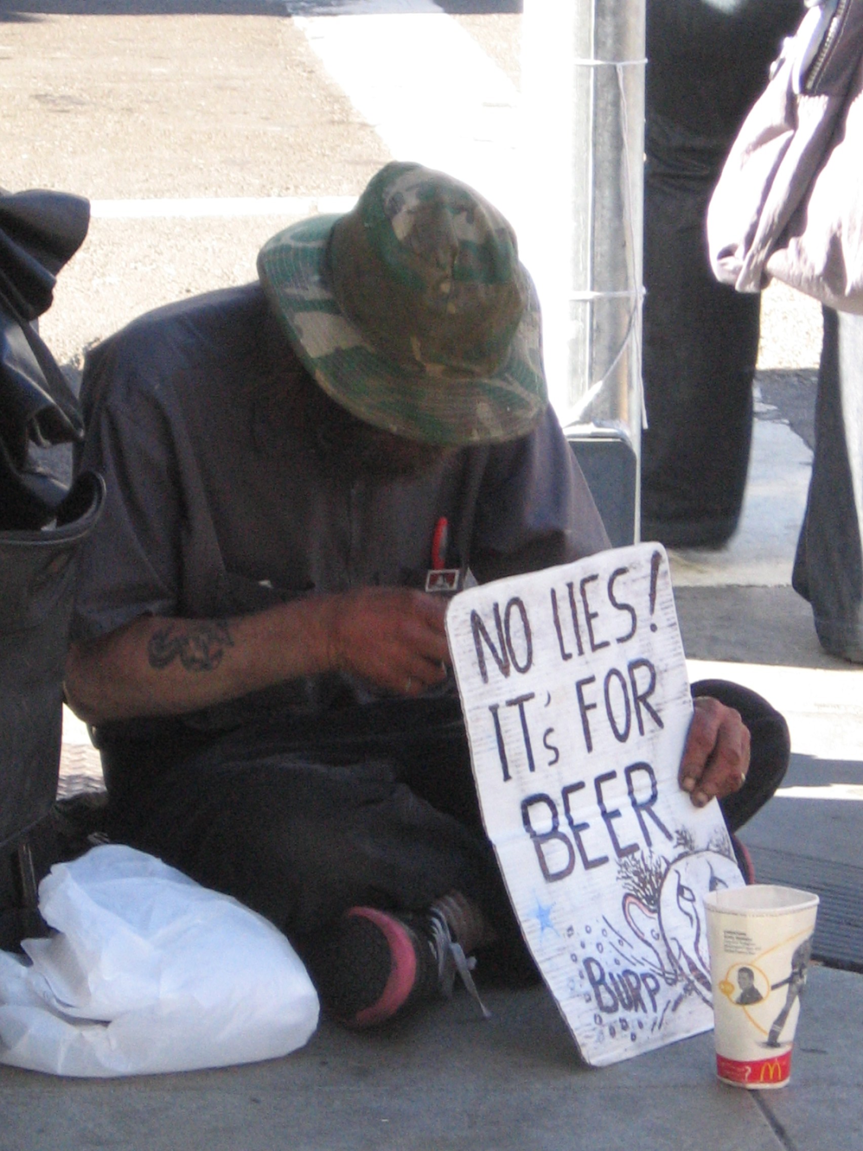 Panhandler we saw in San Francisco with a funny sign