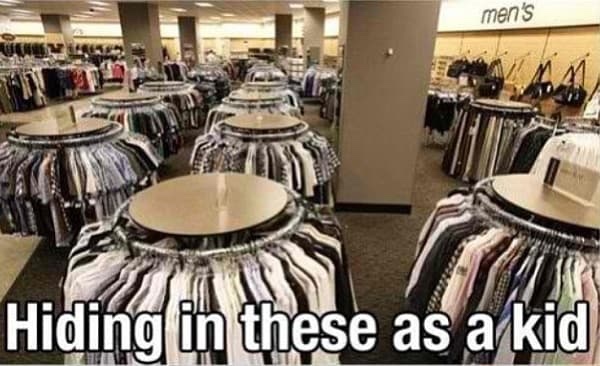 nostalgic pictures - kids hiding in clothing rack - men's Hiding in these as a kid