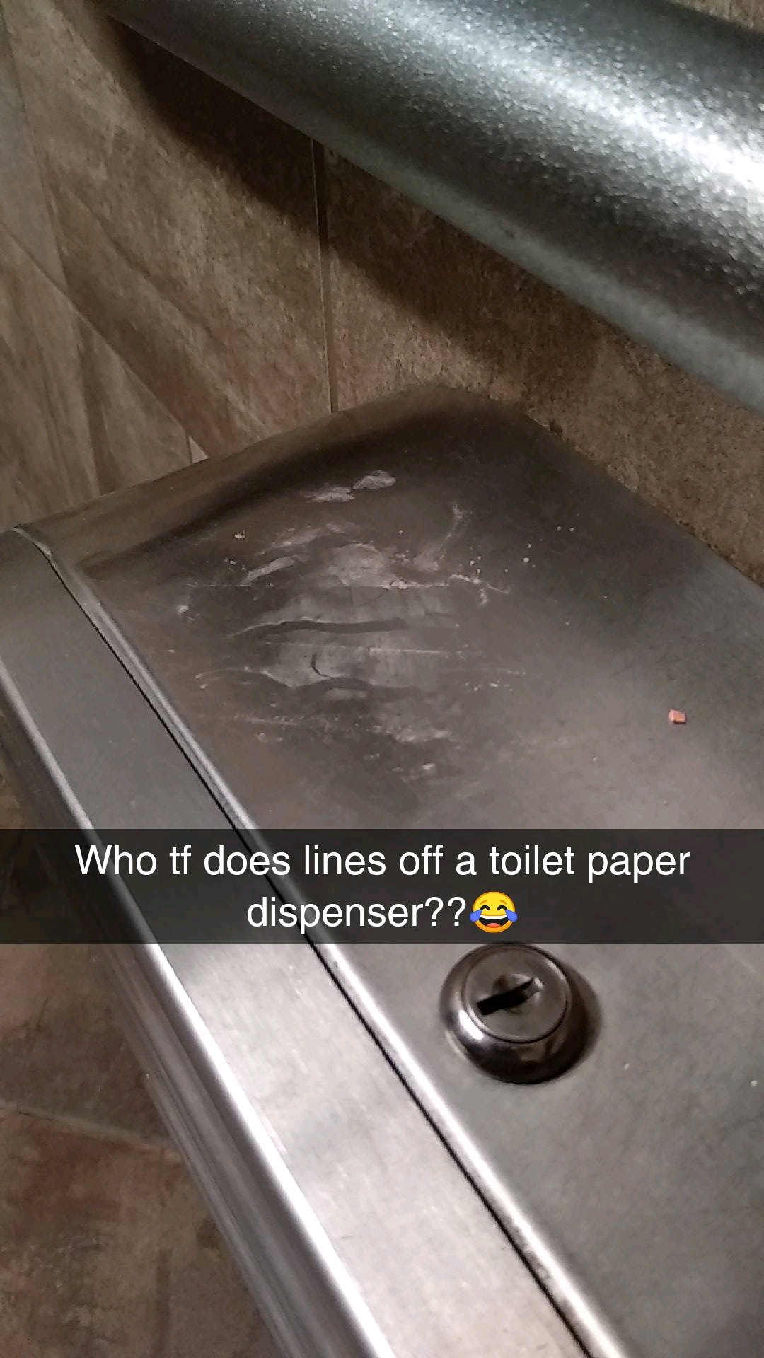 floor - Who tf does lines off a toilet paper dispenser??