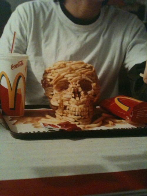 A skull made out of McDonalds french fries.