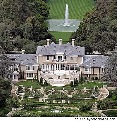 Oprah's got 14 bathrooms and 10 fireplaces in this $55 mil Montecito, CA estate. 