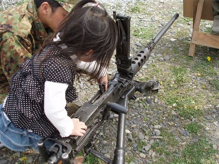 Asian girls and guns