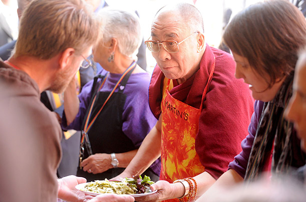 The Dalai Lama volunteering