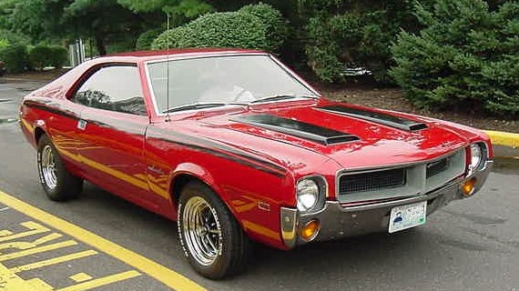 AMC used to make cool cars. Cars like the Javelin available with a 5.6L V8, but Chrysler Corporation was formed from the remains of AMC after Chrysler's 1987 buyout