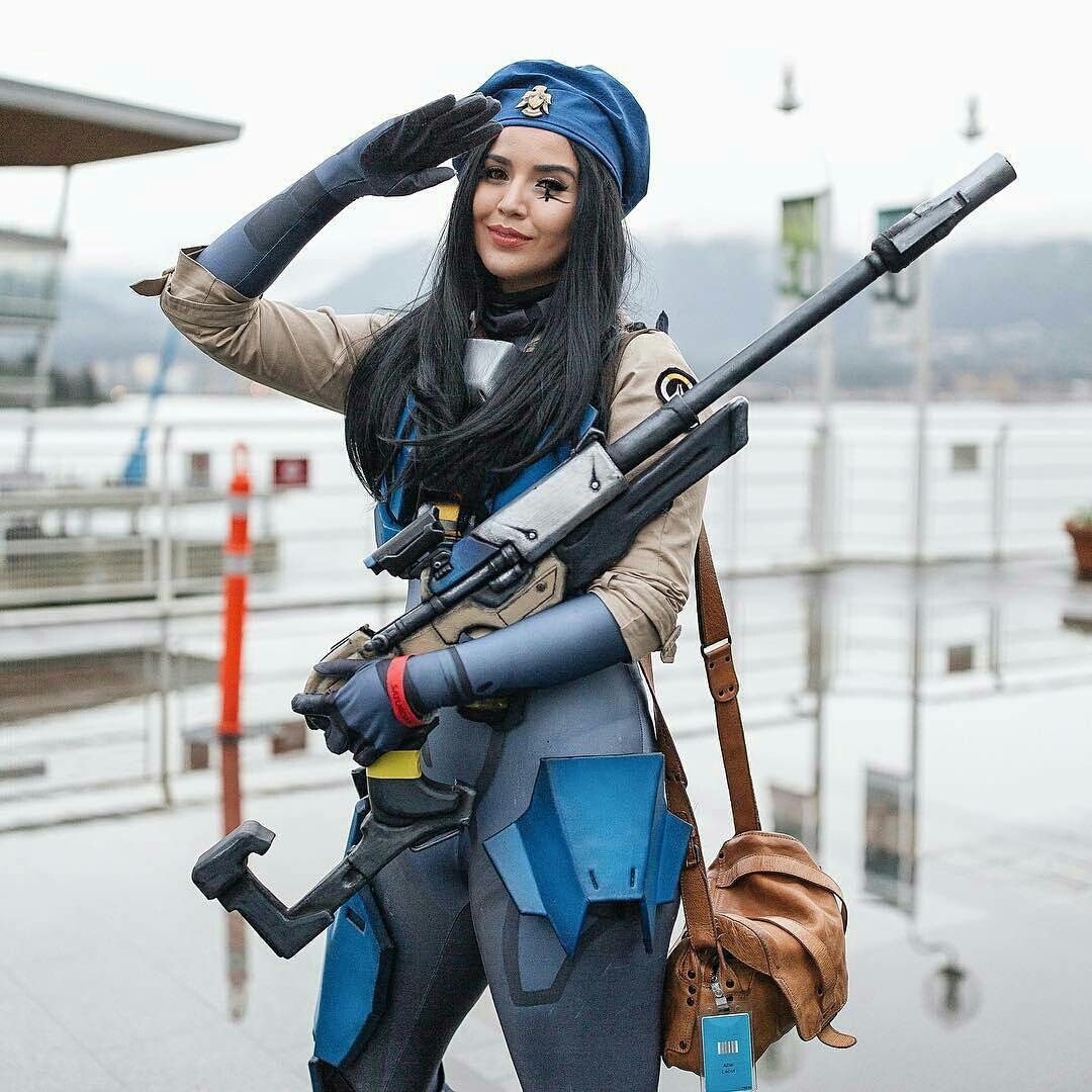 Overwatch cosplay of healer with a sniper rifle