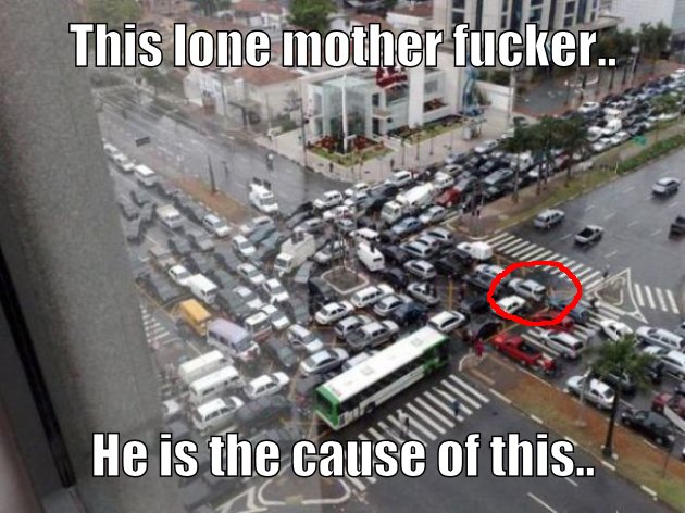 I've seen this damn picture for years and it pisses me off every time. The circled guy.. if he would just move, then that line of traffic could move forward, and everyone else would slowly begin to sort itself out.
