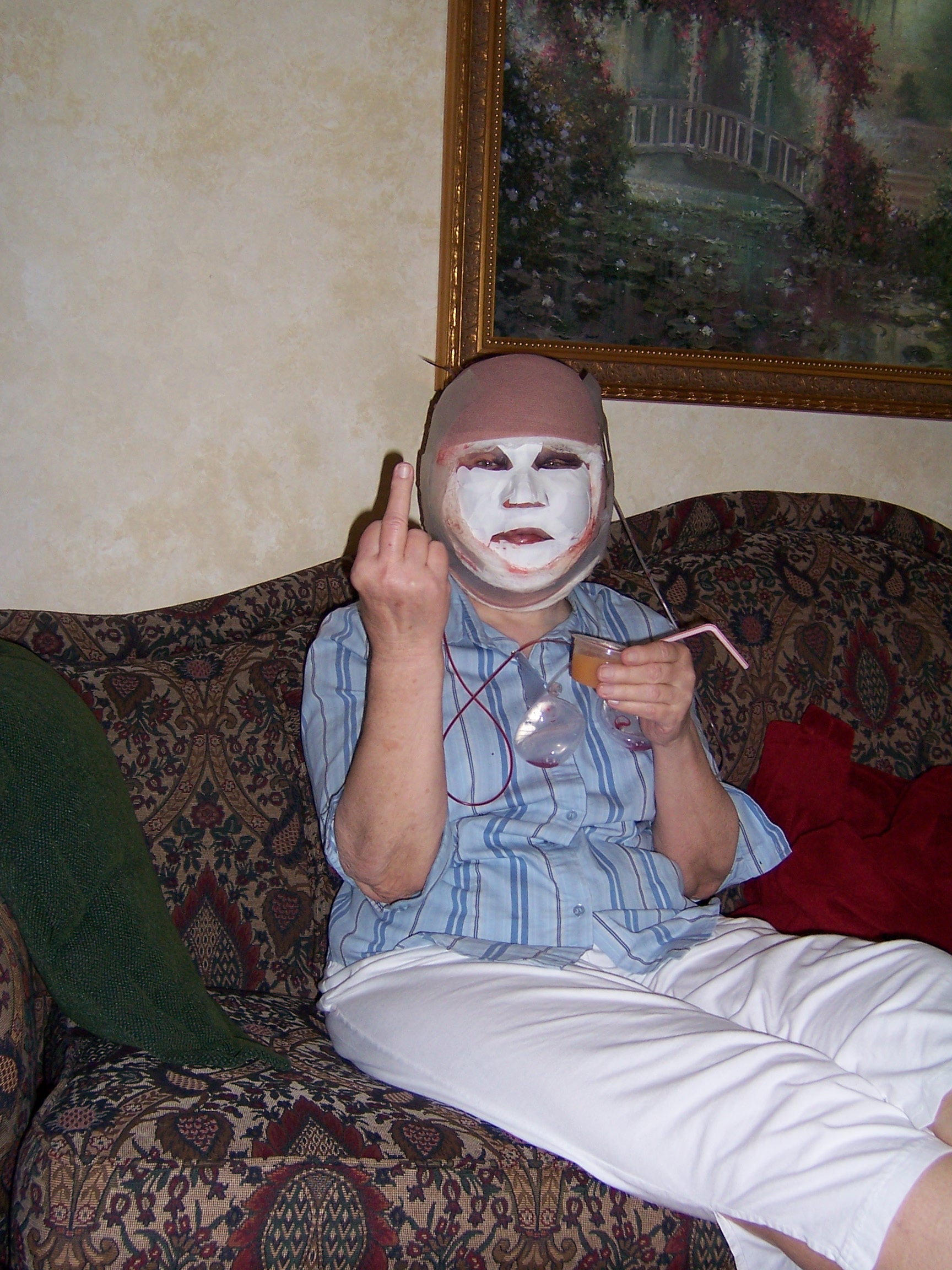 my grandma after face lift looks like a mike myers. oh and shes flicking off the camara, great role model eh? lol