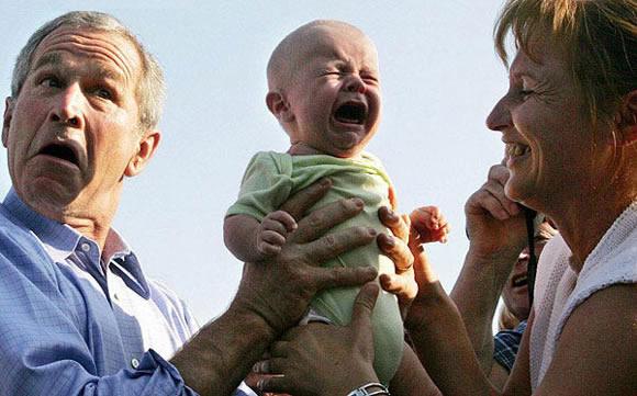 Who's face looks worse the president's or the baby's?