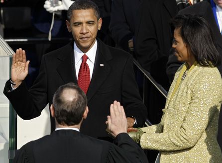 He was sworn in and Michelle got a new dress!