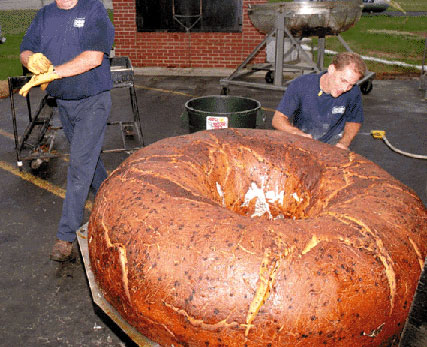Check out the world's largest blueberry bagel created at the Lender's Bagel Bakery in Mattoon, Illinois, 1998.
Stats:
- 714 pounds
- 13.75 inches 
- 59 inches in diameter, with a 15 inch diameter hole

