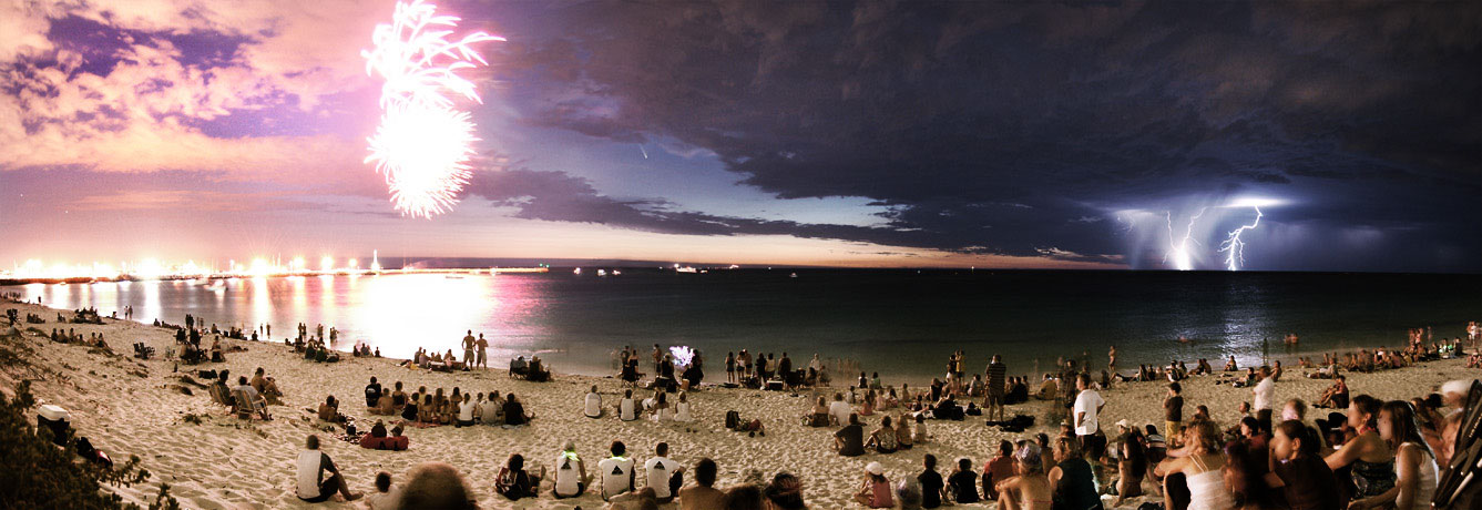 This was not photoshopped. The lucky photographer got a panoramic photo of fireworks, a lightning strike, and a comet all in one snap.