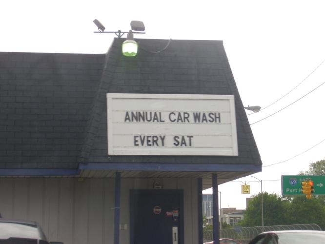 The Annual Car Wash apparently takes place once a week - and to boot, this was a sign on a strip club!