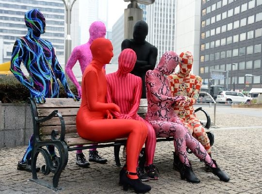 An organization called the Zentai Project, based in England, explains it as a tight, colorful suit that transforms a normal person into amusement for all who see them.