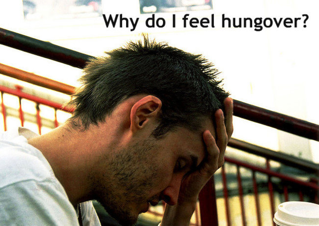 sad college student - Why do I feel hungover?