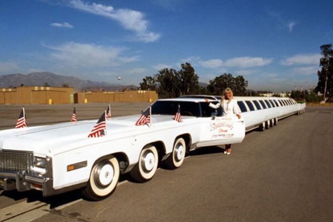 The American Dream is owned by car collector and designer Jay Ohrberg. It is the worlds longest limo, stretching for 100 feet, and has 26 wheels. Its long list of features include a heated Jacuzzi, a sun deck, a swimming pool, king sized beds, and a helicopter landing pad. This mansion on wheels is worth about 4 million.